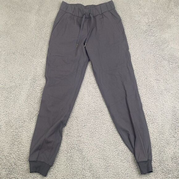Lululemon On The Fly Jogger Pants Black Size 2 Drawstring Logo LW5cpjs - Picture 1 of 9